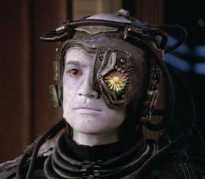Sadly, one eye implant wouldn't be enough for me.  My right eye is almost blind too.  Perhaps I could be a Borg with a cool Transformeresque name, like "GoggleBot"...